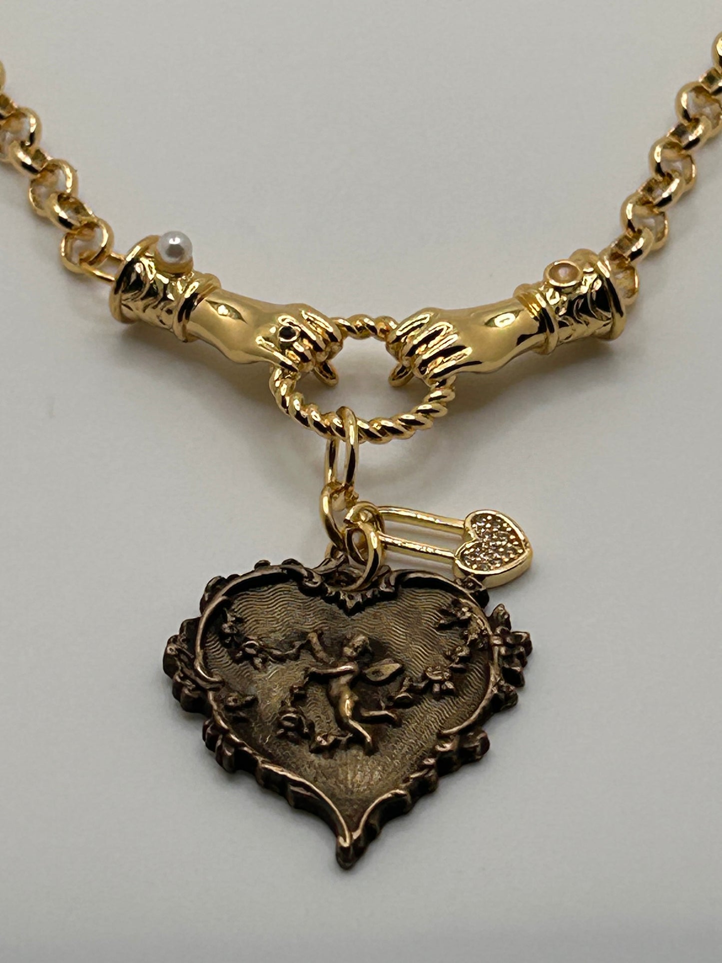 Cherub charm necklace