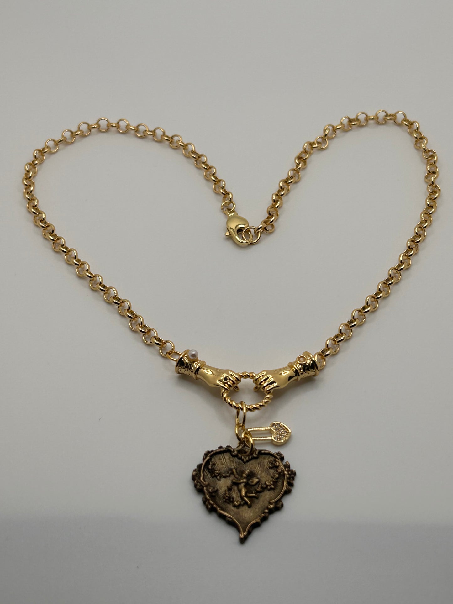 Cherub charm necklace