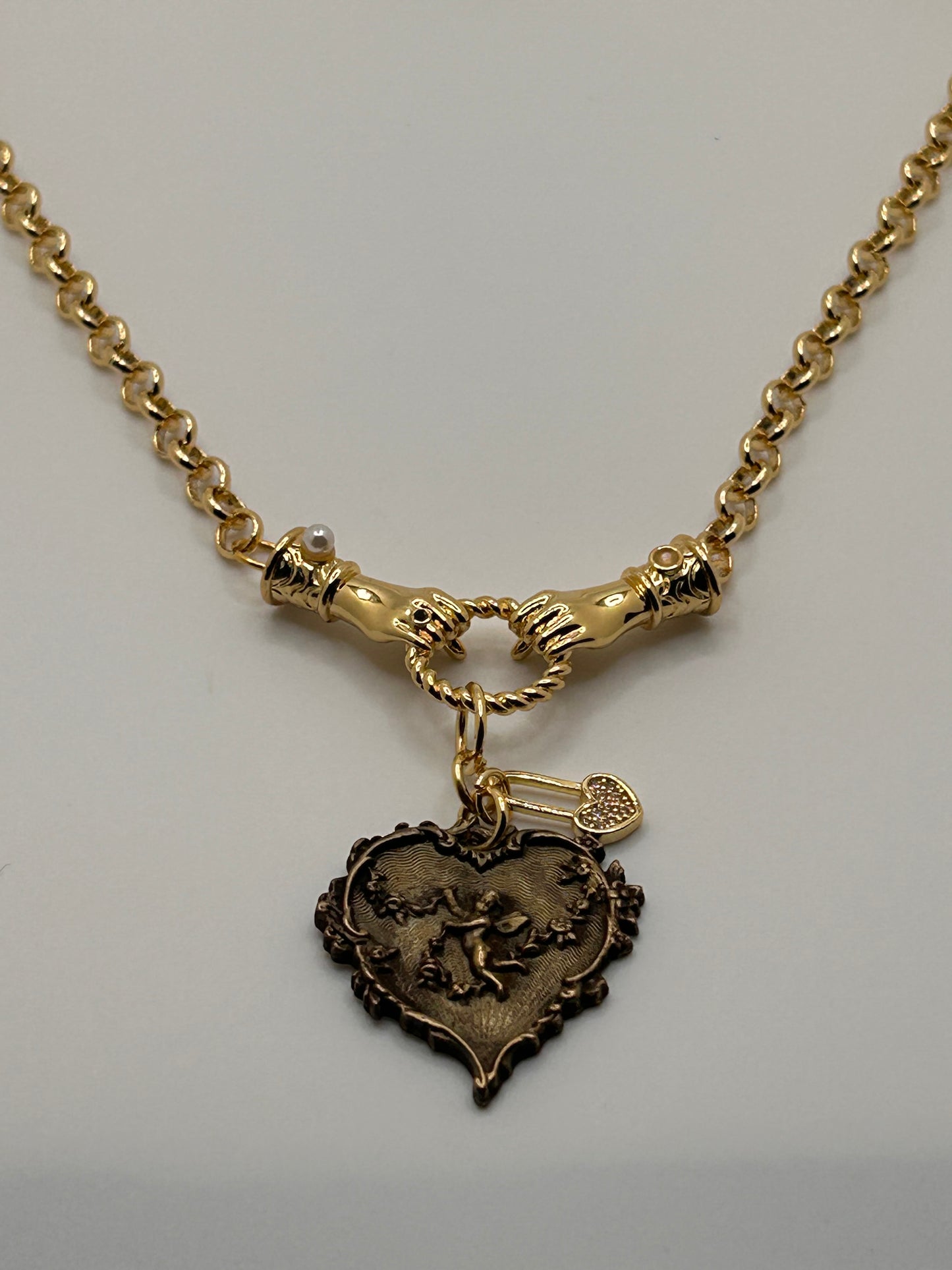 Cherub charm necklace